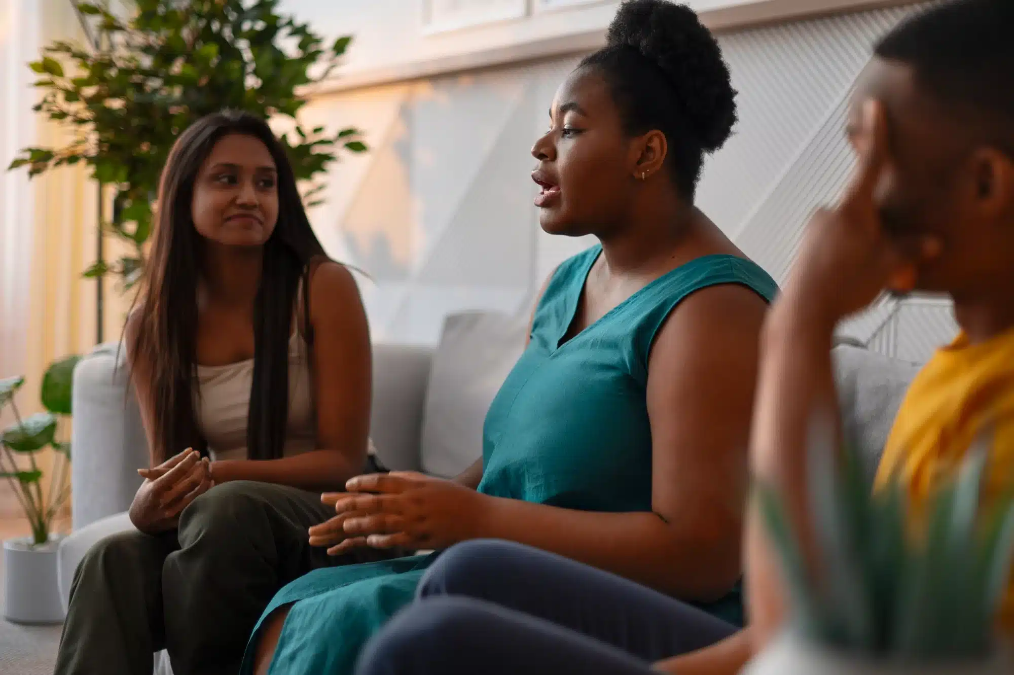 women talking in group setting