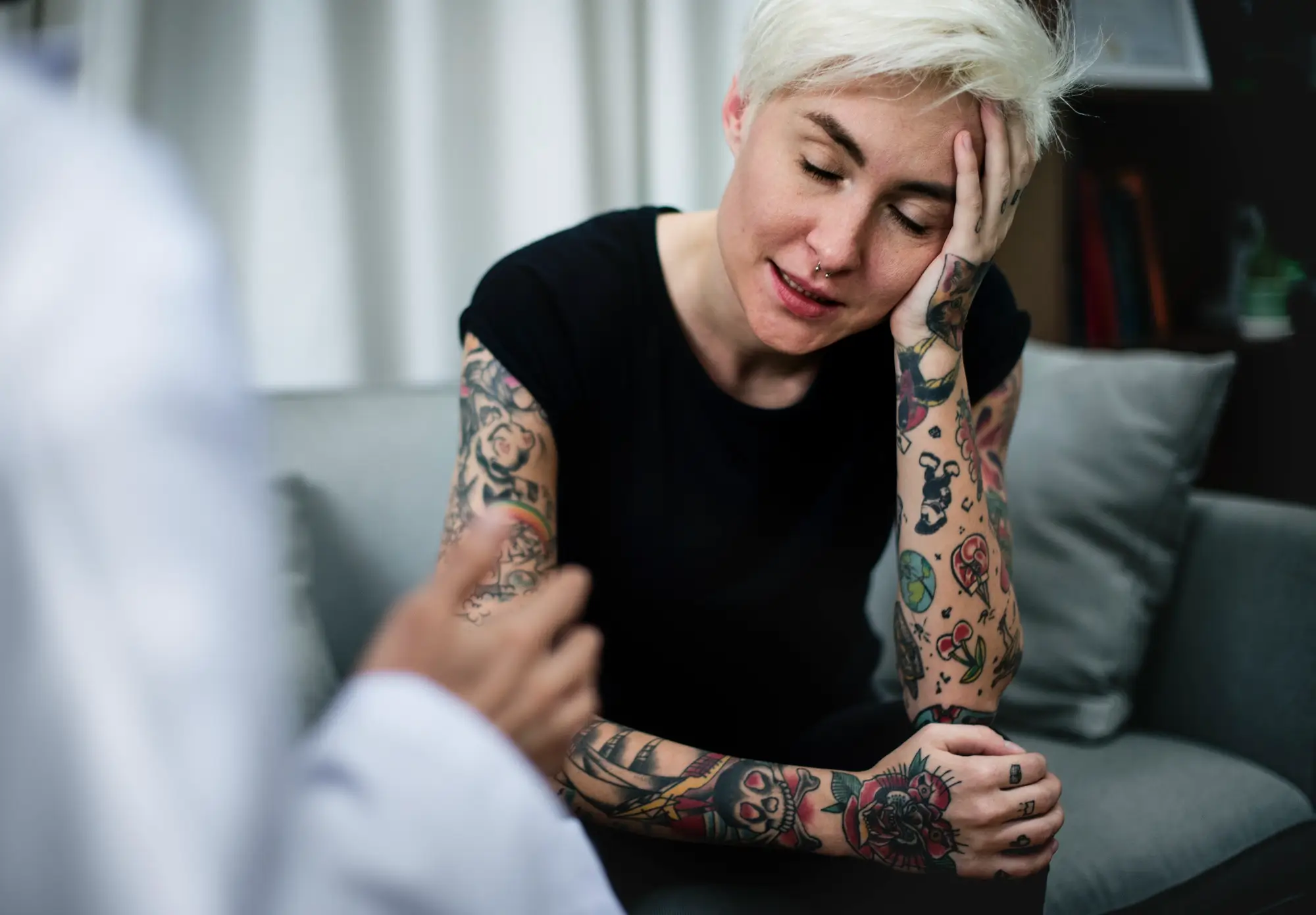 woman talking to healthcare provider in a medical clinic